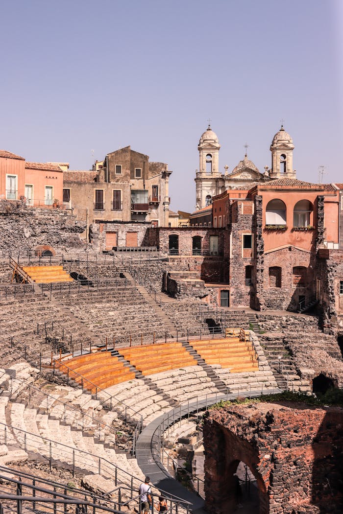 Explore the historic Roman Theatre in Catania, Sicily, showcasing ancient architecture and rich history.